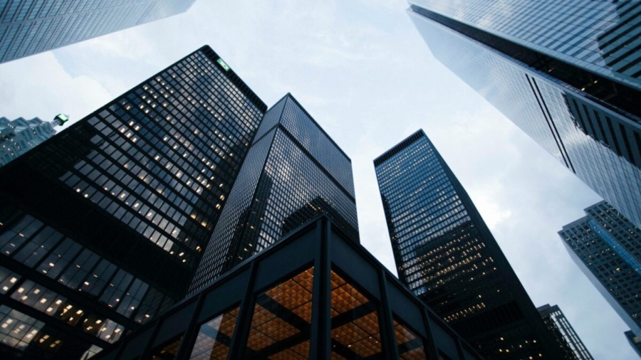 odern high-rise commercial office buildings and premium corporate skyscrapers representing institutional real estate investments.